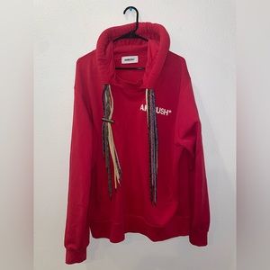 Great condition fashion brand AMBUSH red hoodie with lots of drawstrings.